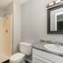 bathroom with white cabinets at Eastview Apartments in Springfield MO