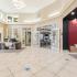 Light-filled, tile-floored receptions area at  Edge at Lafayette | Student Housing Lafayette, LA