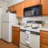 Galley Kitchen | Almond Appliances | Microwave over stove