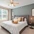 Spacious bedroom with ceiling fan at The Parq at Chesterfield Apartment Homes, Chesterfield, MO  63017