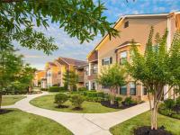 Exteriors and Walking Path | Apartments in Tomball, TX | Avenues at Northpointe