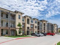Apartments Exterior and Parking Lot | Apartments in Fort Worth, TX | Alleia at Presidio