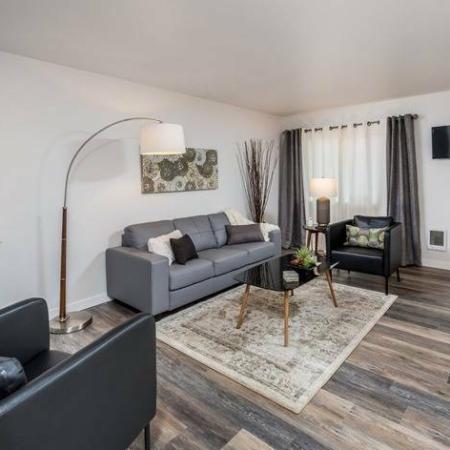 Living Room with Wood-Inspired Flooring | Bend OR Apartments | Sienna Pointe