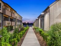 N Leasing Office Exterior with Parking Spaces | Apartments in Edgewood WA | 207 East