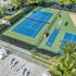 Drone overview of pool area, gaming courts and outdoor dining.