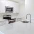All white cabinet kitchen, upgraded fixtures and stainless appliance package.