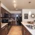 Apartments in Germantown Nashville-909 Flats-Kitchen with Spacious Cabinets, Appliances, and Spotlight Lighting