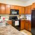 Kitchen with Black Appliances | Canton Woods