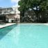 Sparkling resident pool with picnic tables | Apartment Amenities | Houston, Texas 77004