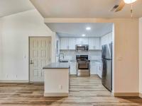 kitchen with breakfast bar and stainless steel appliances and at redfield ridge apartments