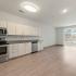 Kitchen with stainless appliances and white cabinets