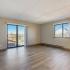 Renovated 2 Bedroom Tower Prospective Living Room with attached balcony at The Views of Naperville apartments