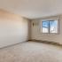 Renovated 2 Bedroom Tower Prospective Bedroom with carpet & window at The Views of Naperville apartments