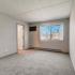 Renovated 2 Bedroom Garden Insight Bedroom with carpeted floor at The Views of Naperville apartments