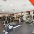 fitness center with cardio and weight machines and free weights