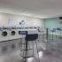Laundry facilities with tables and chairs