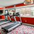 Fitness center with cardio and weight machines and free weights