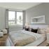Arabella 101, interior, bedroom, white, large window, large bed, wood floor, white furniture, mirror,