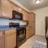 Coryell Courts apartment kitchen, furnished suite