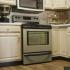 Updated kitchen with stainless steel appliances at Georgetown, Manhattan, Kansas apartment for rent.
