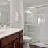 Bathroom with one sink, toilet, and shower