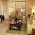 Fallsaff Manor Apts, Interior, living room, walkout patio, sofa, love seat, coffee table, console, plush wall to wall carpet