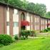 Cranberry Run Apts, Exterior, 3 story buildings, manicured grass, shrubs, and bushes