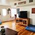 Living area | TV | Wood floors | Fort Hood Military Housing | homes for rent in killen tx