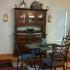 A dining room with elegant metal and glass furniture. | Rental Houses near Peterson AFB, Colorado Springs, CO