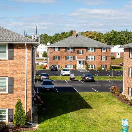 Exterior view from parking area | Princeton Dover | Dover NH Apartment Buildings