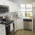 Beautiful kitchen with granite counter tops and stainless steel appliances | Advenir at Cocoplum