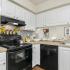 Fully Equipped Kitchen with dishwasher, oven, range, and tons of cabinet space | Advenir at Walden Lake