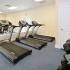 Cutting edge fitness center with exercise equipment at Country manor apartments for rent