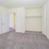 Spacious bedroom with large closet and grey carpeting in Berwyn, PA apartment for rent