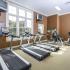 Treadmills and tvs in apartment complex fitness center