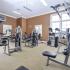 Spacious fitness center with cardio and strength training machines and equipment