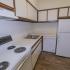 Kitchen with brown and white cabinets at Gayley Park apartments for rent in Media, PA