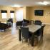 Long Pond Village Apartments, interior, spacious clubhouse, comfortable seating, dining for four, windows