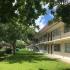 Marcell Gardens Apartments, exterior, 2 story building, grass, trees, cars,