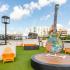 Outdoor courtyard sitting area with guitar decor