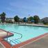 Sparkling outdoor swimming pool at The Commons at Fallsington apartments for rent in Morrisville, PA