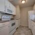 Coryell Crossing Apartments with white cabinets and white appliances